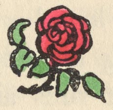 A small red rose with green leaves.