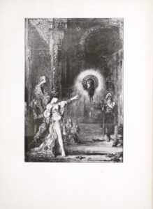 This is a halftone reproduction of the Moreau watercolour of the Apparition (not to be confused with the similar but different oil painting of the same title and subject), in which Salome is confronted with the severed head of John the Baptist at King Herod’s court. Salome stands in the foreground to the left of the image in a revealing jewel-encrusted gown. She wears a jeweled corset with nothing covering her breasts, an elaborate shawl, necklace, and bracelets. The floral skirt parts at the hip to reveal her left leg with her bare foot and jeweled ankle visible to the viewer. She has an elaborate crown on her head and a long braid of hair falling down her back. She is in three-quarter profile facing right toward the head of John the Baptist, which hangs mid-air in the right foreground, with light radiating around it like a star or the sun. Blood is dropping from his neck and he is in profile facing Salome. Behind Salome, a man with a large hat draped in cloth sits in profile facing left on what appears to be a throne, suggesting he is Herod. He is facing right but looking downward. Sitting beside Herod on the ground in front of his throne, a woman gazes up with a worried look on her face at the severed head; likely this is Herodias, Salome’s mother. In the background, to the direct right of Salome, another woman sits on the ground playing a lute. To the right of the severed head a guard stands, with long robes, a bare chest and cloth wrapped around his head, obscuring his face. He leans on a spear to his right with both hands resting on it. In the background a decorated column, arched doorway, and tall decorated walls are visible, suggesting that they are in the throne room of the palace.