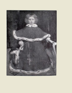 Image is of a child The girl is shown full frontally wearing a coat with a caplet that is trimmed with ermine The belt around the coat is a piece of rope tied in a bow The coat reaches the floor the childs body is completely hidden save for their head and hands The childs hands barely poke out from under their coat The right hand is holding on to an object the left is resting on the arm of a chair The child has light coloured curly hair that barely reaches their chin The floor has a diamond pattern the background is dark and undefined The artists signature E A Walton is in the bottom right corner The image is vertically displayed